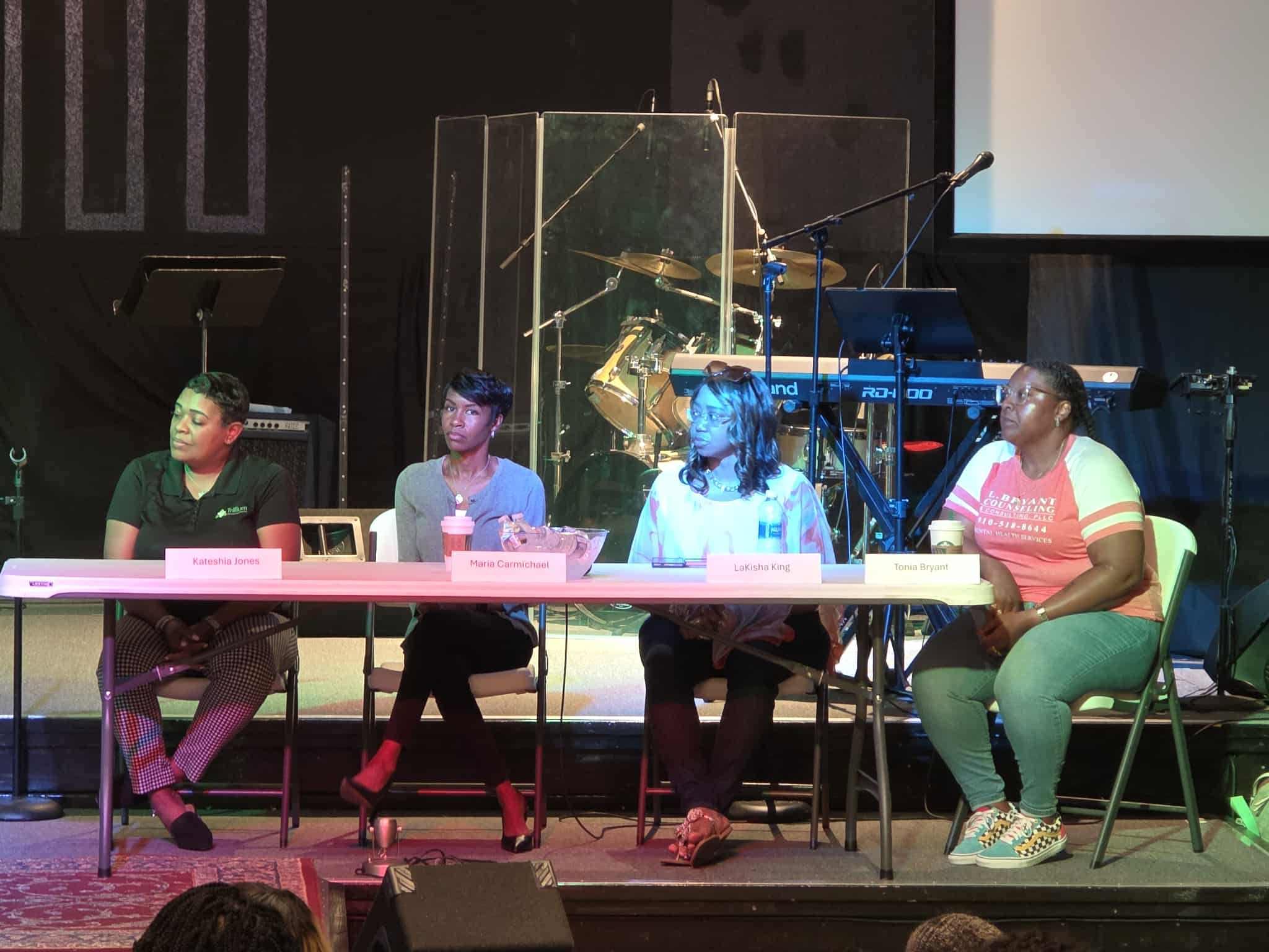 Lontonia Bryant participating in a mental health panel at Kingdom Partnership Christian Center